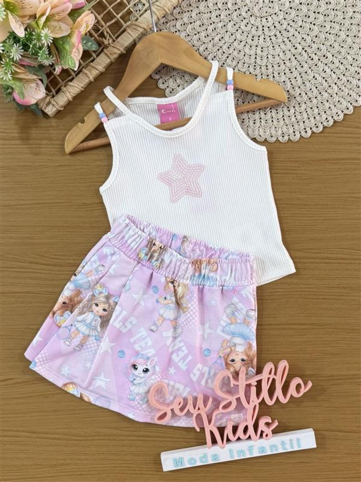 Conjunto Infantil Cinti Verão com Shorts Saia Rosa Estampado e Regata Estrelinha