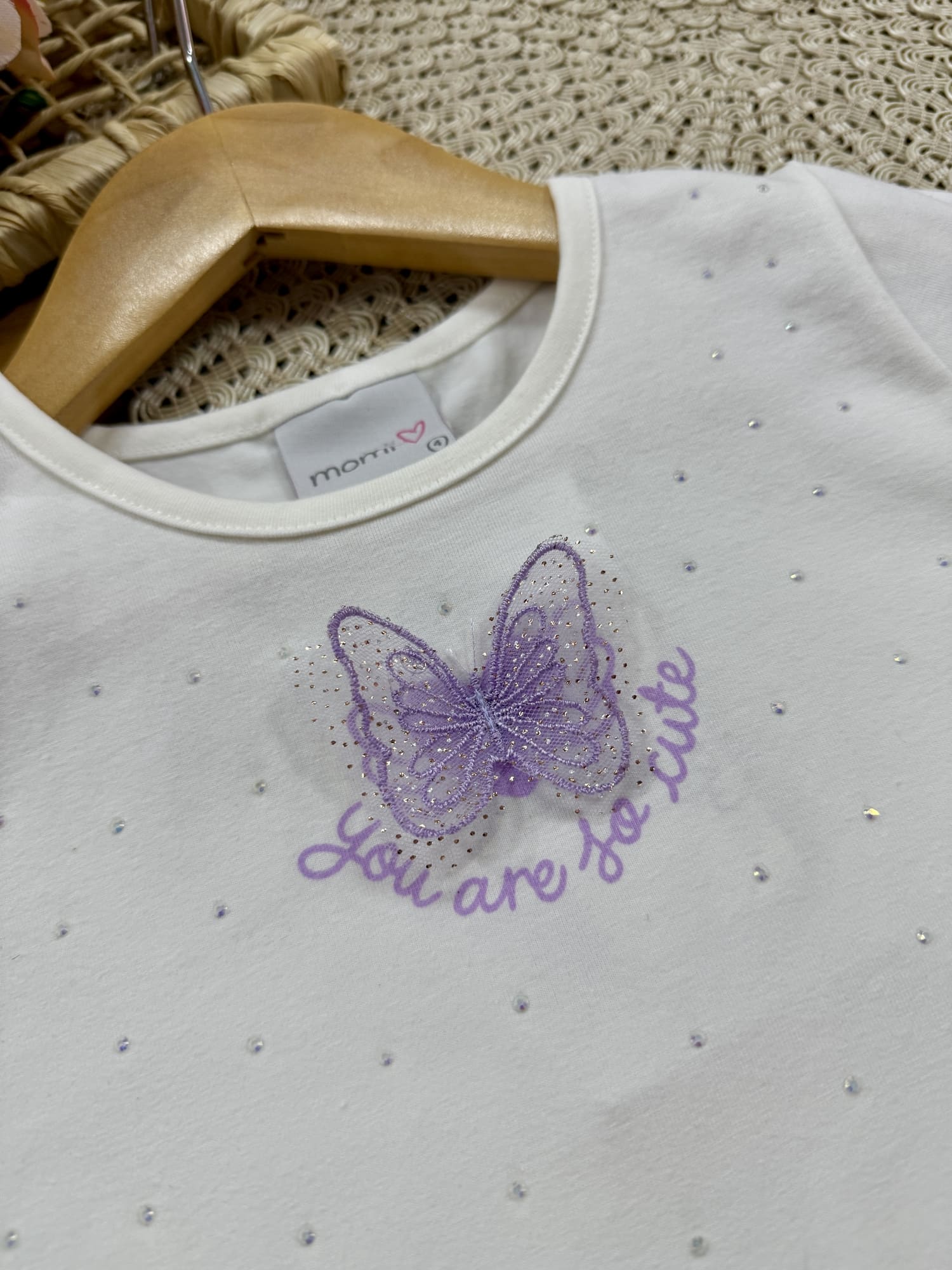 Conjunto Infantil Momi Verão com Short-Saia Lilás e Blusa Branca Borboletinha Strass