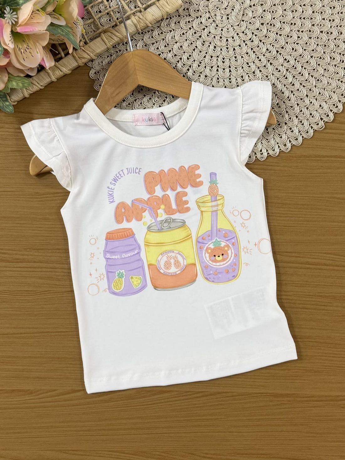 Conjunto Infantil Kukiê Verão com Shorts Saia Laranja e Blusa Branca Pine Apple