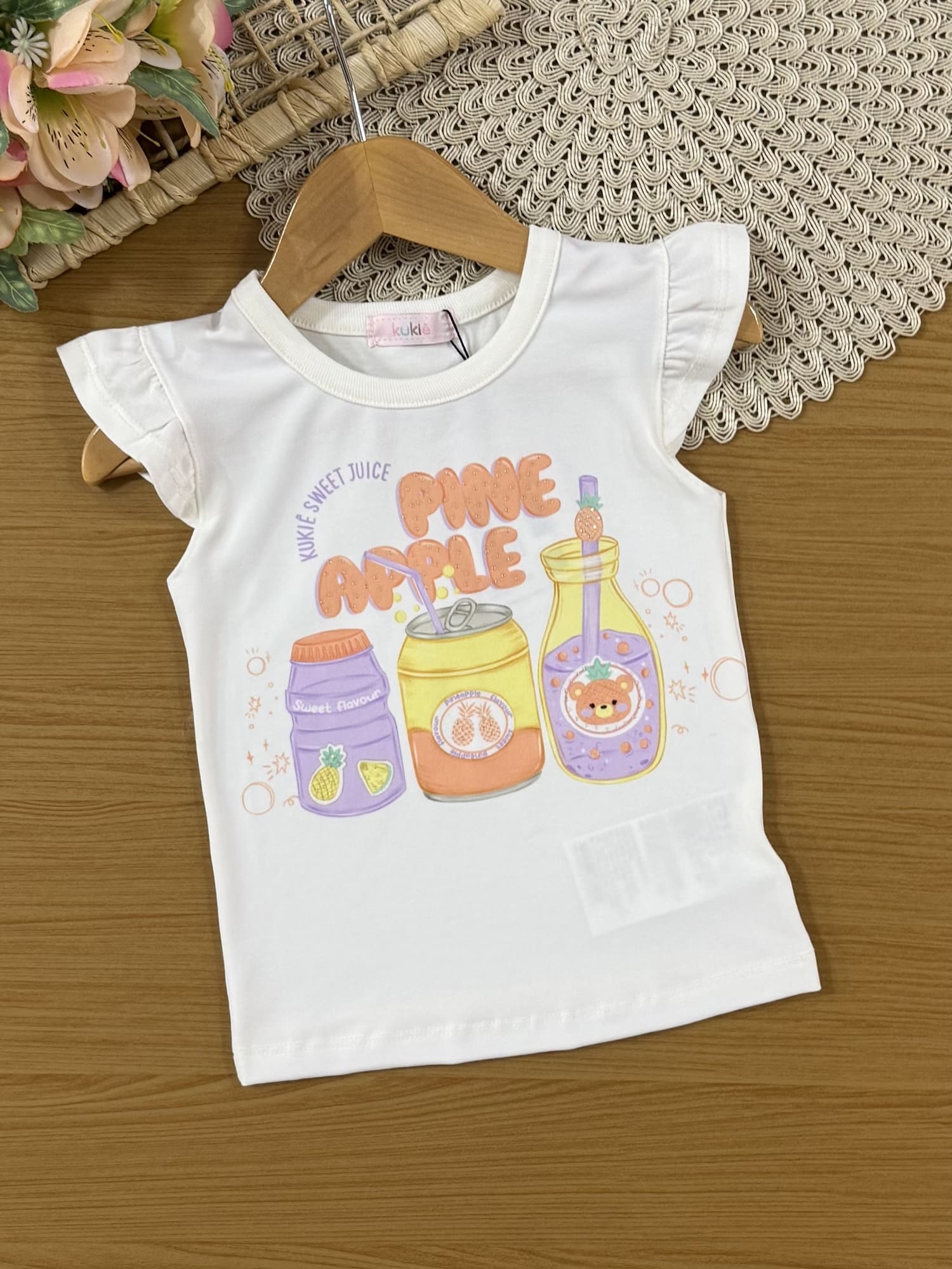 Conjunto Infantil Kukiê Verão com Shorts Saia Laranja e Blusa Branca Pine Apple