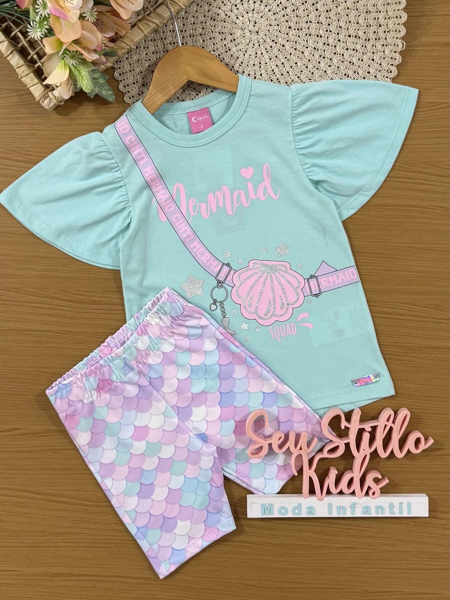 Conjunto Infantil Cinti Verão com Shorts Ciclista e Blusa Azul Conchinha