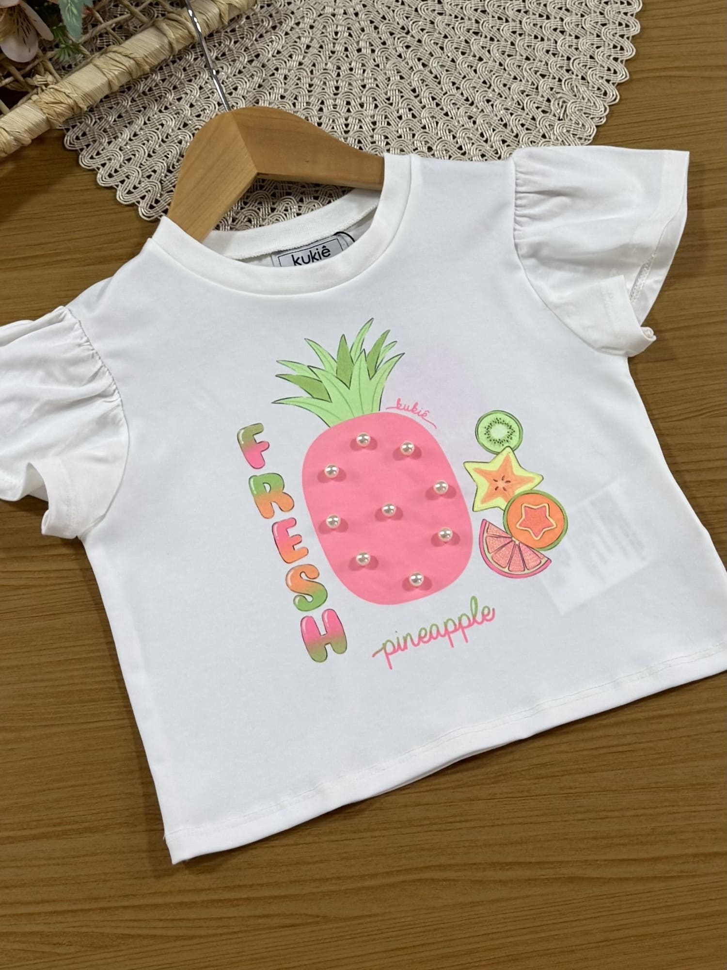 Conjunto Infantil Kukiê com Shorts Saia Rosa e Blusa Manga Curta Frutinhas