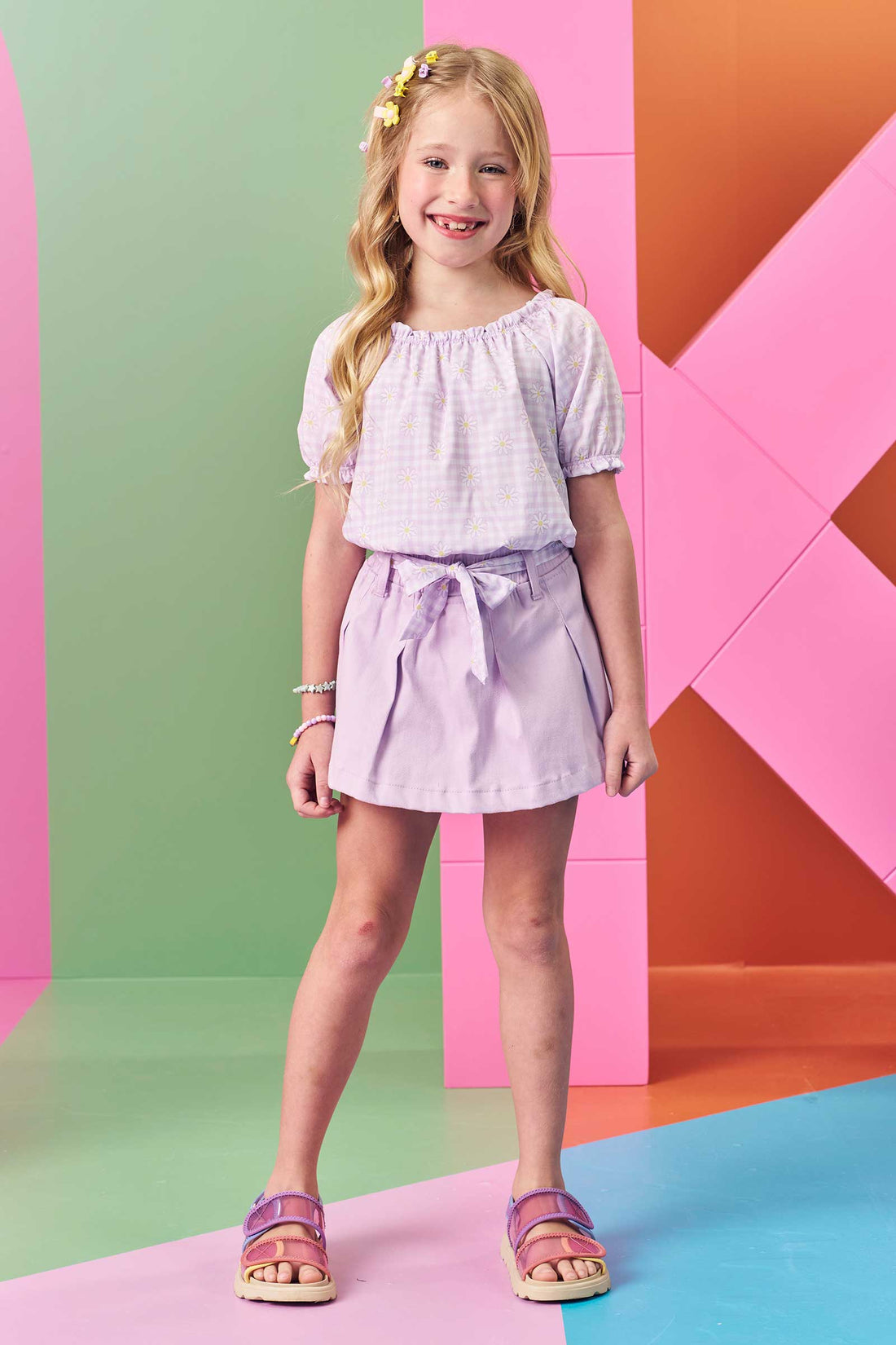 Conjunto Infantil Kukie Verão Com Shorts Saia Lilás e Blusa Florzinha