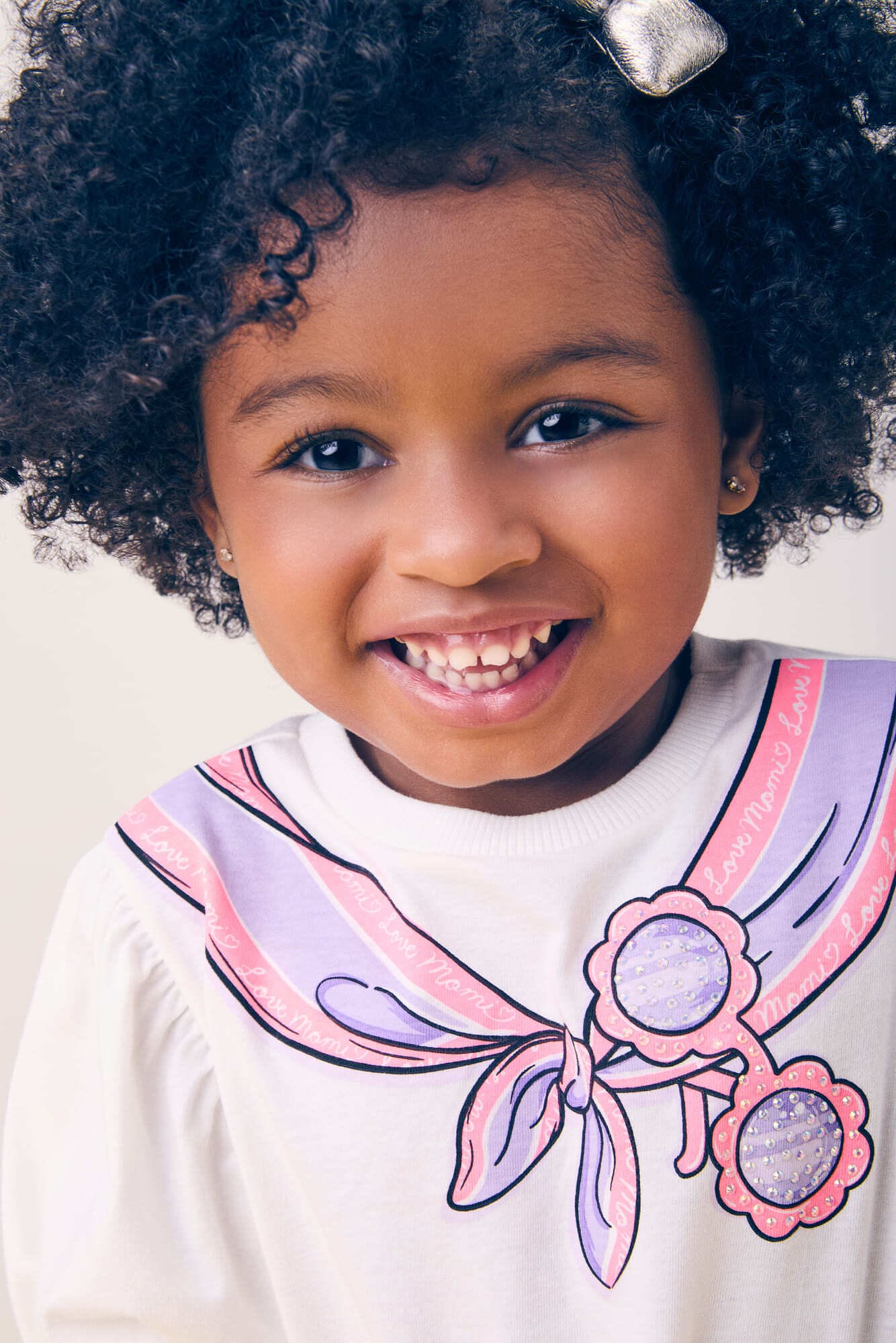 Conjunto Infantil Momi Verão com Shorts Saia Lilás e Blusa Branca Laço