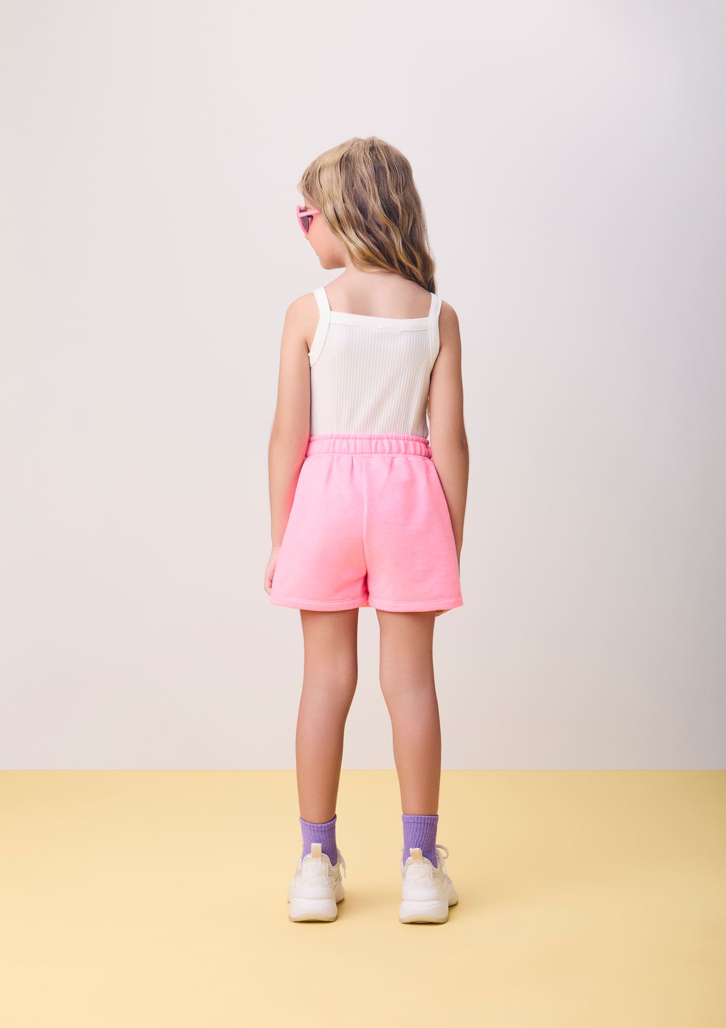 Conjunto Infantil Momi Verão com Shorts Saia Rosa e Regata Branca Hello Kitty Lacinho