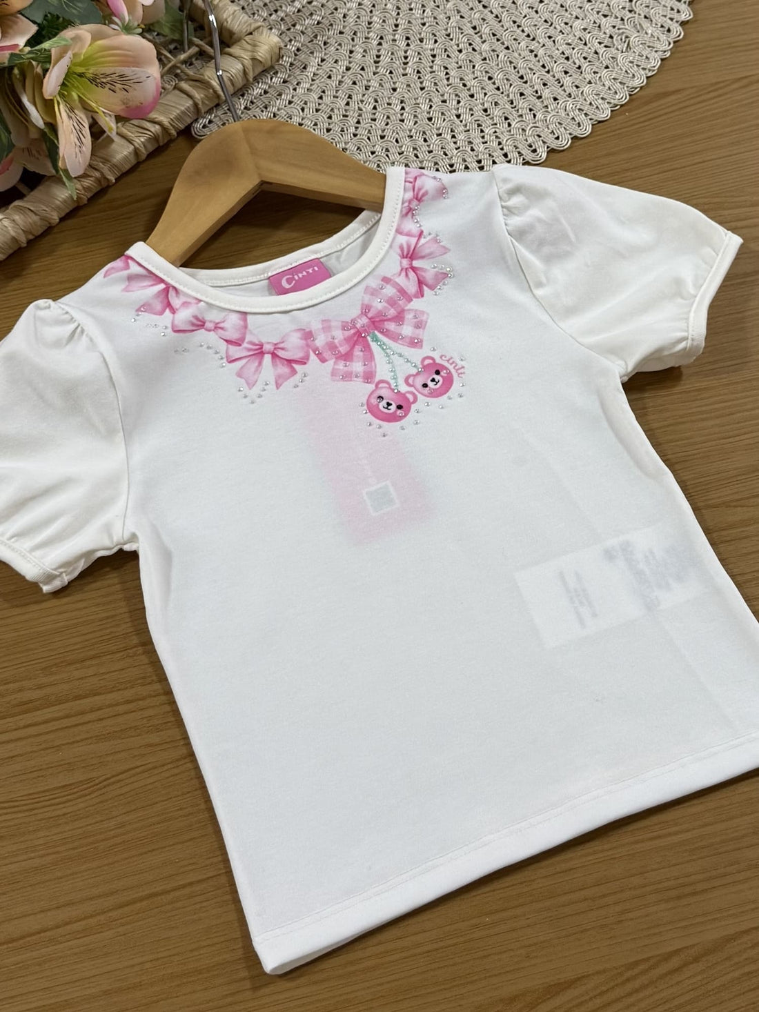 Conjunto Infantil Cinti Verão com Shorts Saia Rosa e Blusa Branca Lacinhos