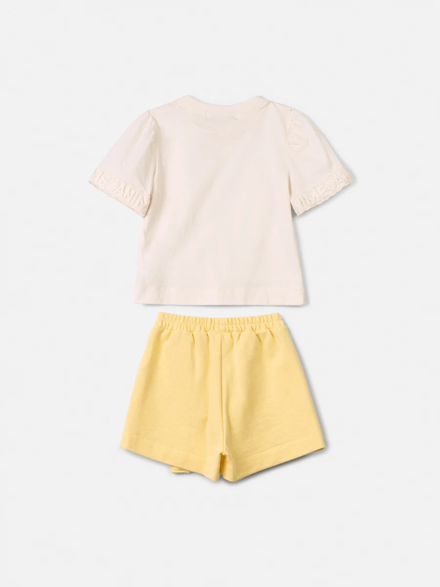 Conjunto Infantil Menina Animê com Shorts Saia Amarelo e Blusa Bege Bordada