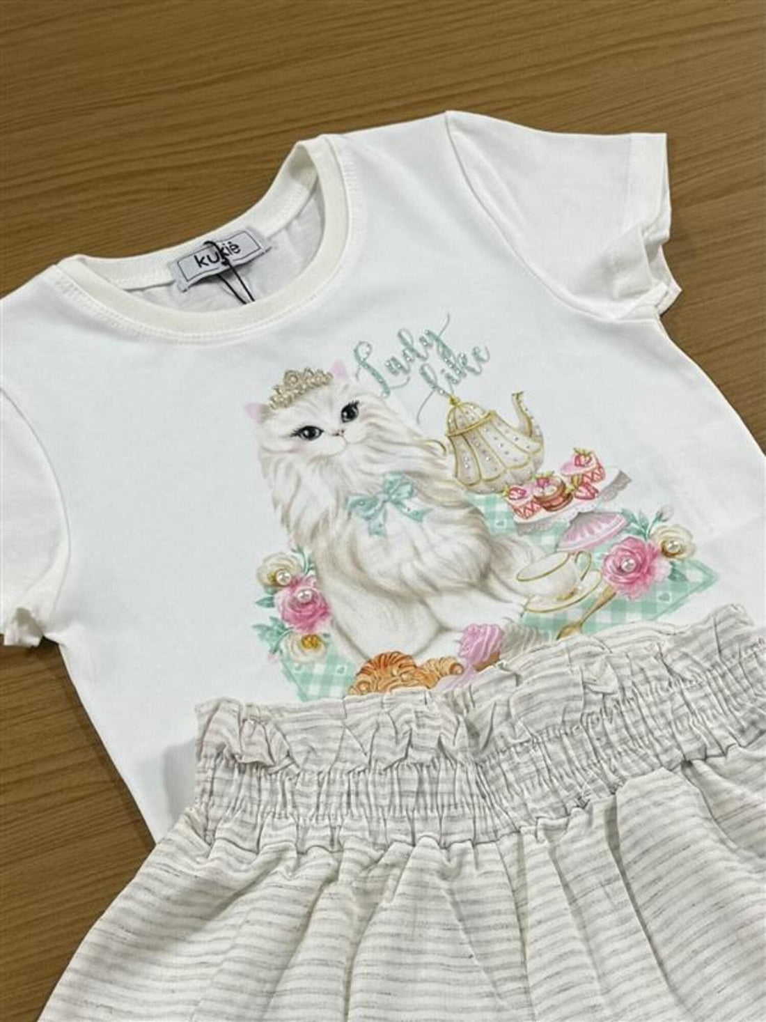 Conjunto Infantil Kukiê com Shorts Off White e Blusa Manga Curta Gatinha Princesa