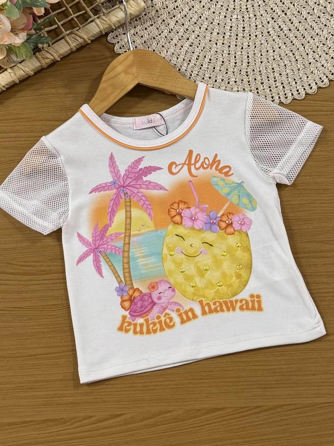 Conjunto Infantil Kukiê Verão com Shorts Saia Laranja e Blusa Branca Tropical